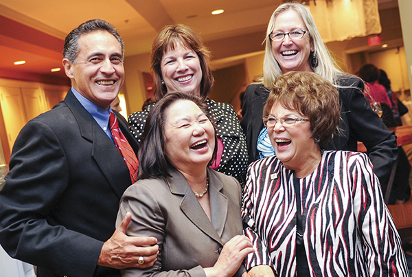 Dan with group of people laughing