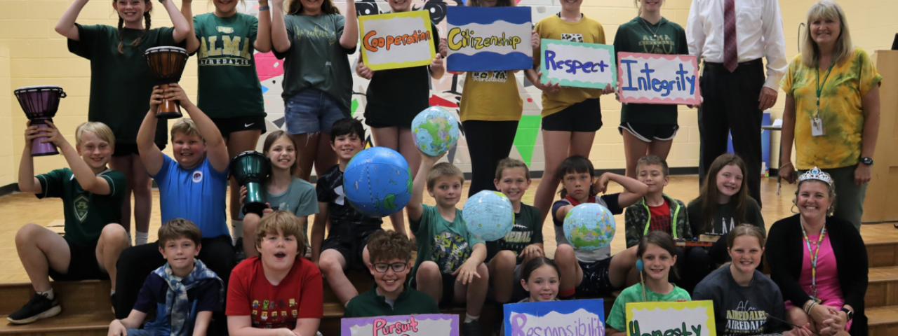 Children holding signs