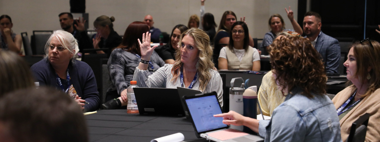 EPIC attendee with hand raised