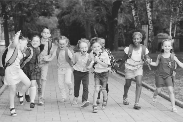 Kids excitedly walking to school