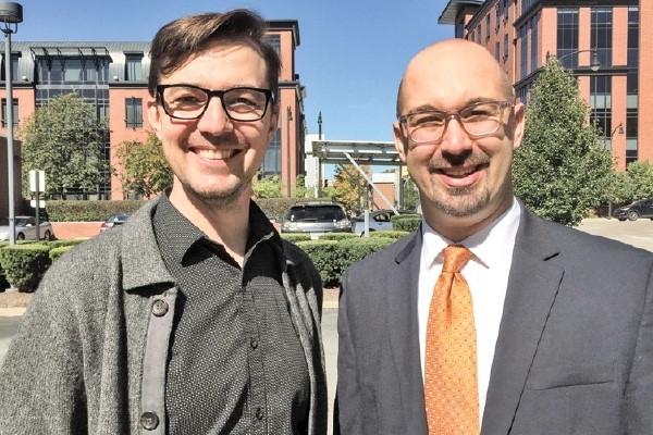 Aaron Sames poses for a photo with a friend
