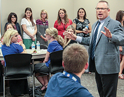 Bill Redinger leads a workshop with several school administrators