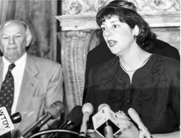 Joan Wade speaks at a press conference
