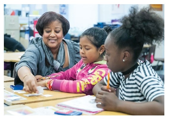 Kelley Hough working with students