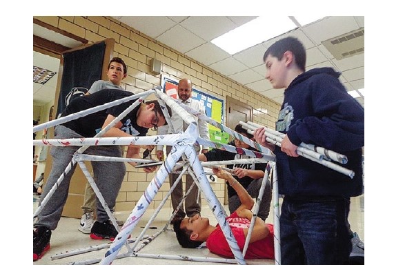 Astronomy students building geodesic domes