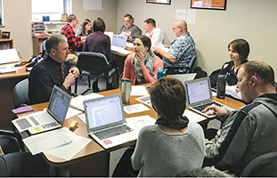 The grading committee consists of teachers and administrators in the Solon, Iowa, district, where standards-based grading started with eight teachers in 2008.