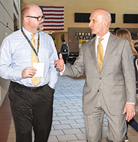 Robert Rammer (right) with Matt Biscan, principal of Wheaton North High School in Illinois.
