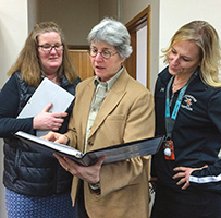 Marguerite Rizzi (center), superintendent in Stoughton, Mass., with learning time specialist Lynda Feeney (left) and high school principal Juliette Miller.