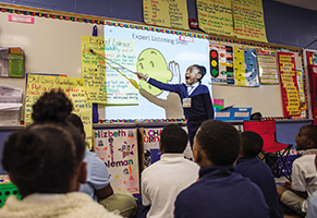 A young student at Wade Park Elementary School in Cleveland, Ohio, leads a discussion with classmates on good listening, a classroom exercise that is part of a districtwide social-emotional learning plan.