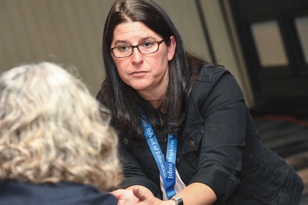 Chrissy Eith works with another co-worker