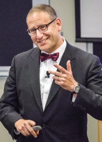 Steven Spear speaks to a group