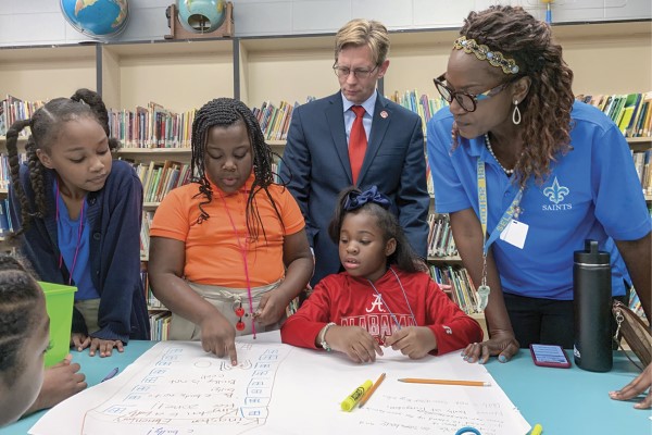 Avis Williams with students