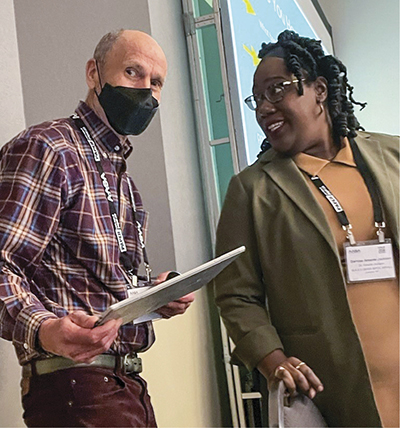 Lee Teitel wearing mask and Darnisa Amante Jackson