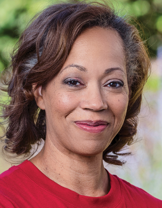 Headshot of a woman wearing red