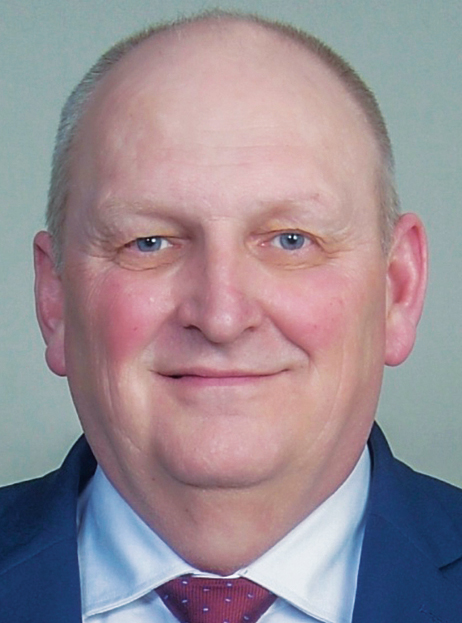 White man smiling headshot