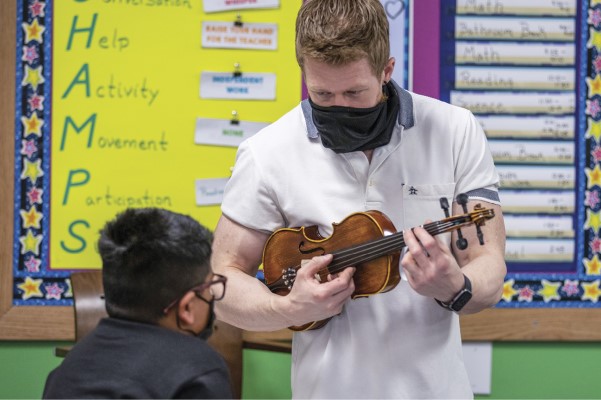 Teacher with violin