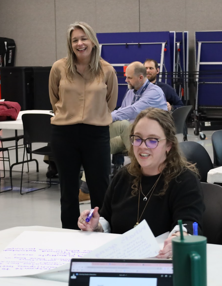 Dr. Starzecki working alongside staff in the Superior School District.