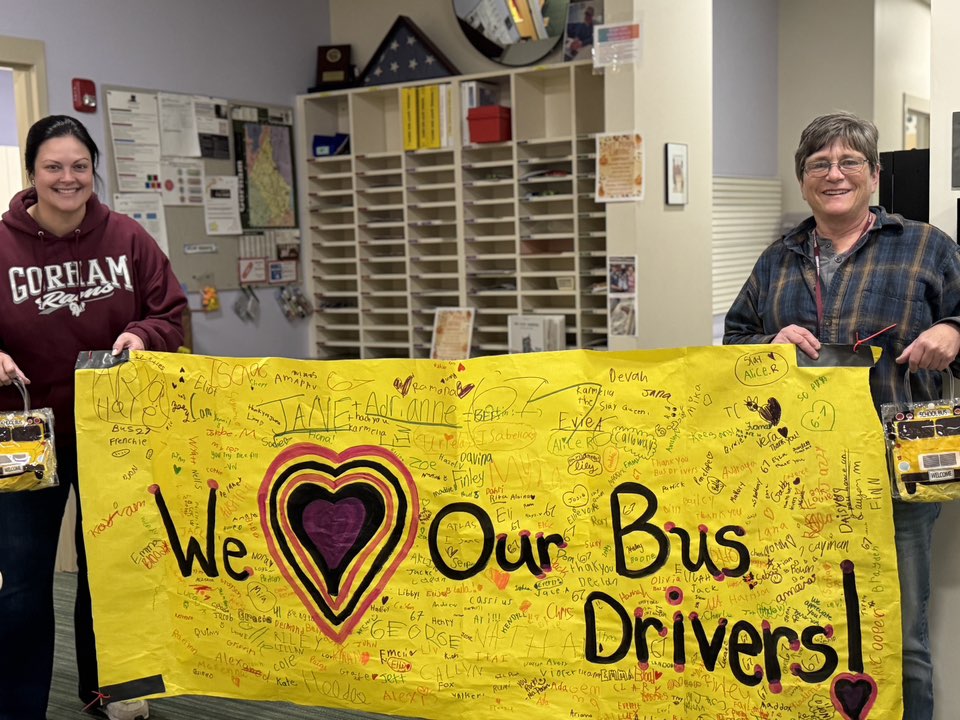 Gorham Schools Bus Drivers and one of our school secretaries holding up a huge banner that students made to honor their drivers during Bus Driver Appreciation Week earlier this fall.