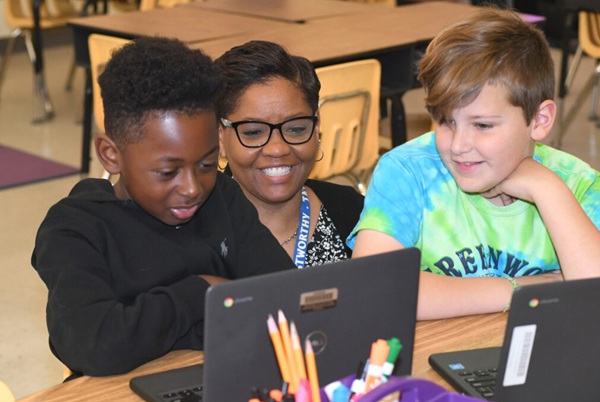 Henrico teacher with students