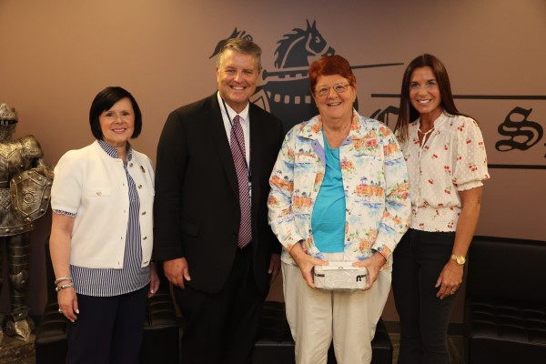 Years of service recognitions include long-time Roanoke County employees like school counselor Joan Farley with over 55 years of service