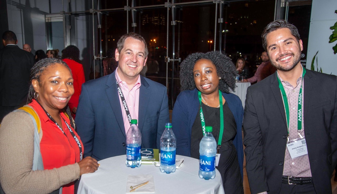 Attendees Gathered at a Welcome Reception