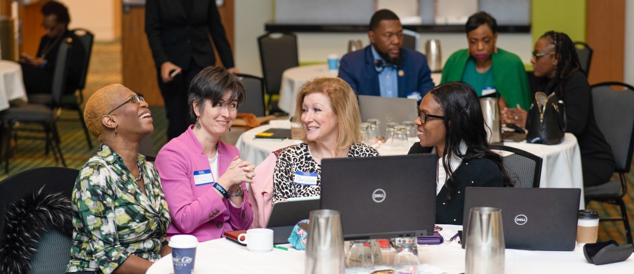 Laughing Attendees at the National Women's Leadership Consortium